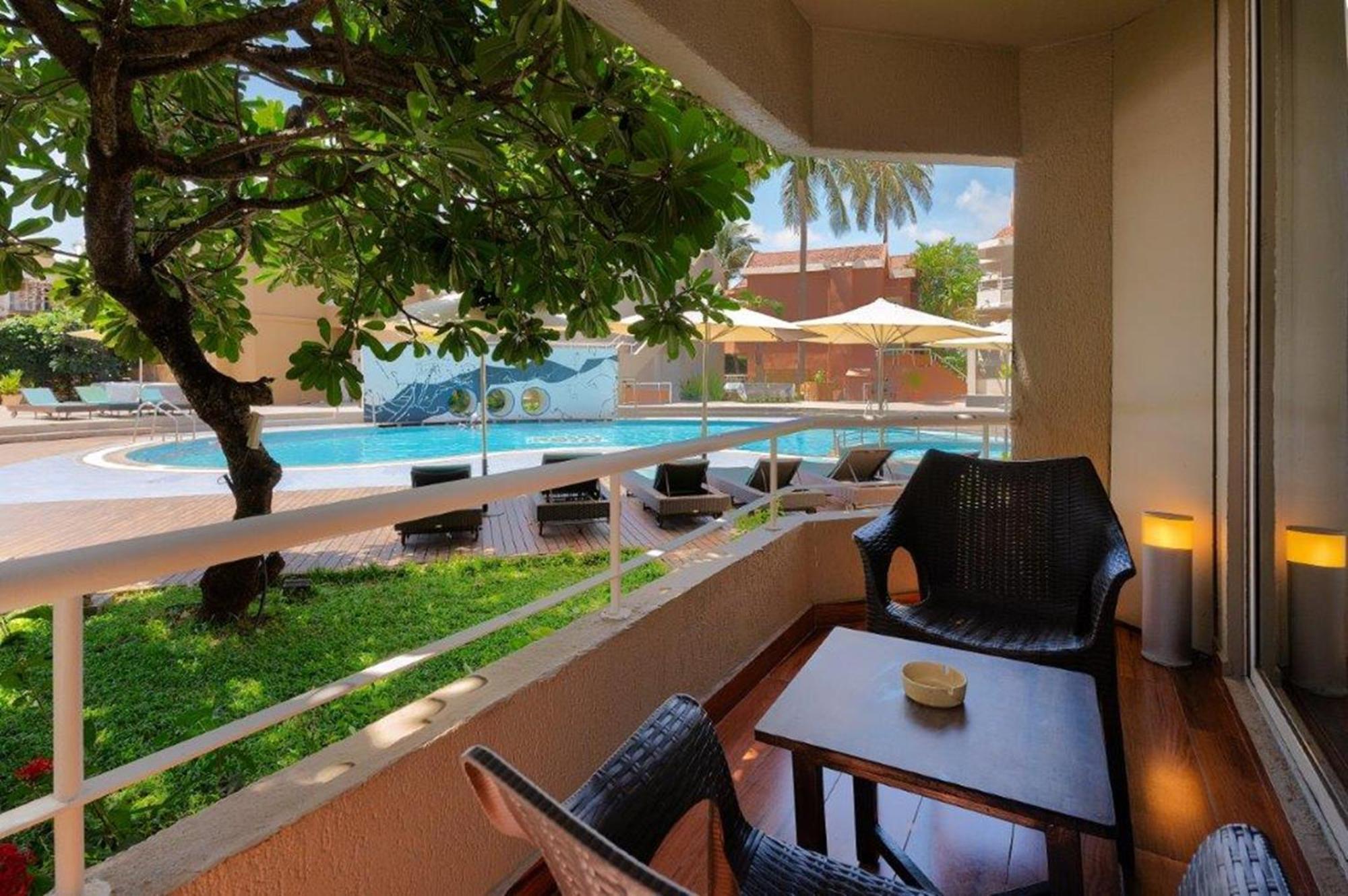 Whispering Palms Beach Resort Candolim Exterior photo